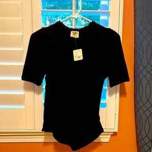 We the tree black top